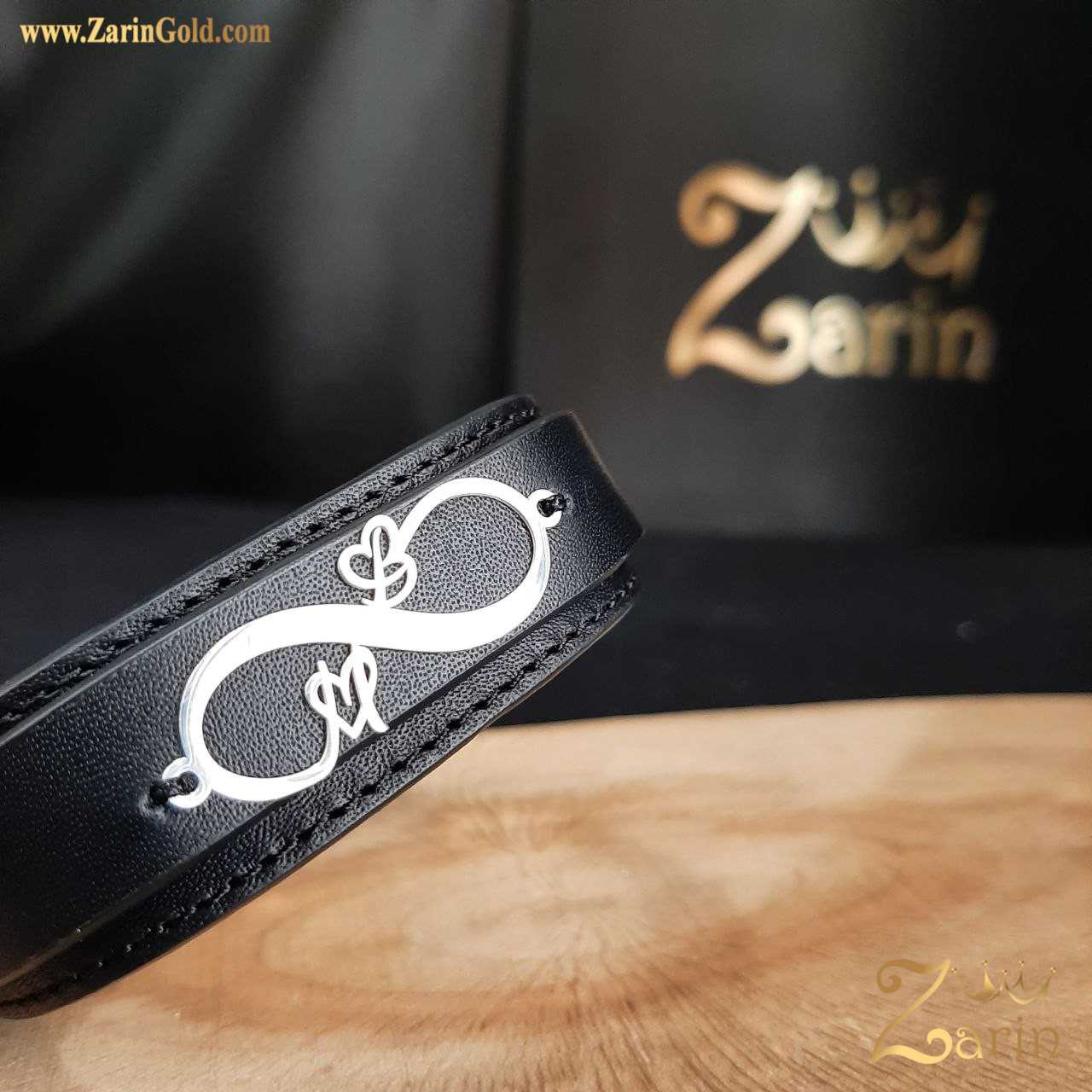 دستبند چرم و طلا سفید بی نهایت با حروف ام بی